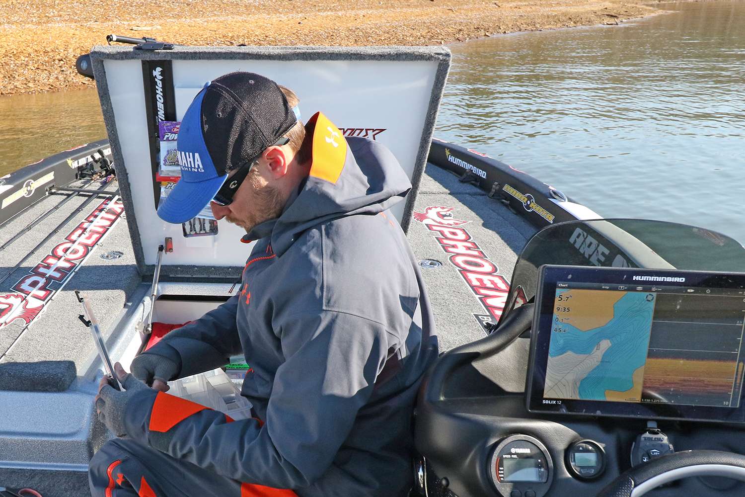 California native and finesse-fishing specialist Justin Lucas now calls Alabama his home. While sitting on the front deck of his fully loaded Phoenix bass boat, Lucas digs for an empty Bass Mafia tray. His goal?