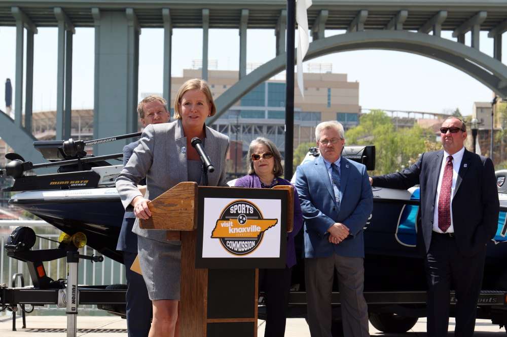Kim Bumpas, president of Visit Knoxville, wrapped up the ceremony thanking B.A.S.S., government agencies, and tourism officials for working together to bring the Classic to Knoxville.  Behind her is the Henley Street bridge, which connects South Knoxville to downtown. 
