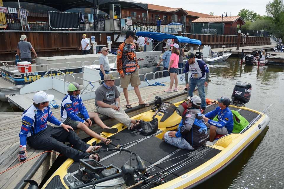 Teams gather around the boat of Levi Wittrock and Gunnar Stanton prior to the Day 2 weigh-in of the Carhartt Bassmaster College Western Tour presented by Bass Pro Shops. 
