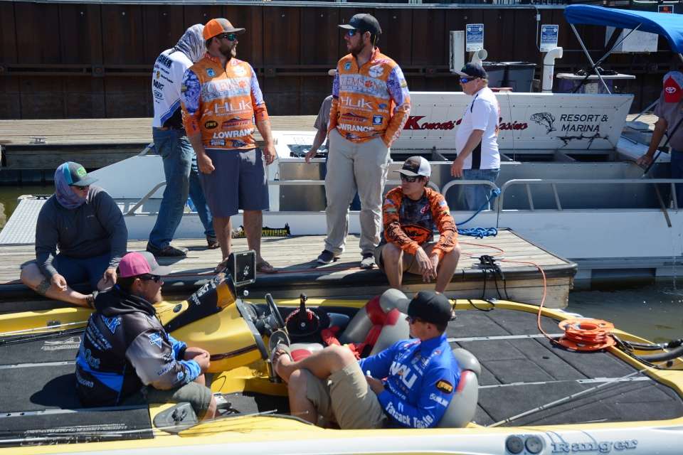 Meanwhile, Joey Price and Bobby Fralix of Clemson University recap the day with other anglers. 