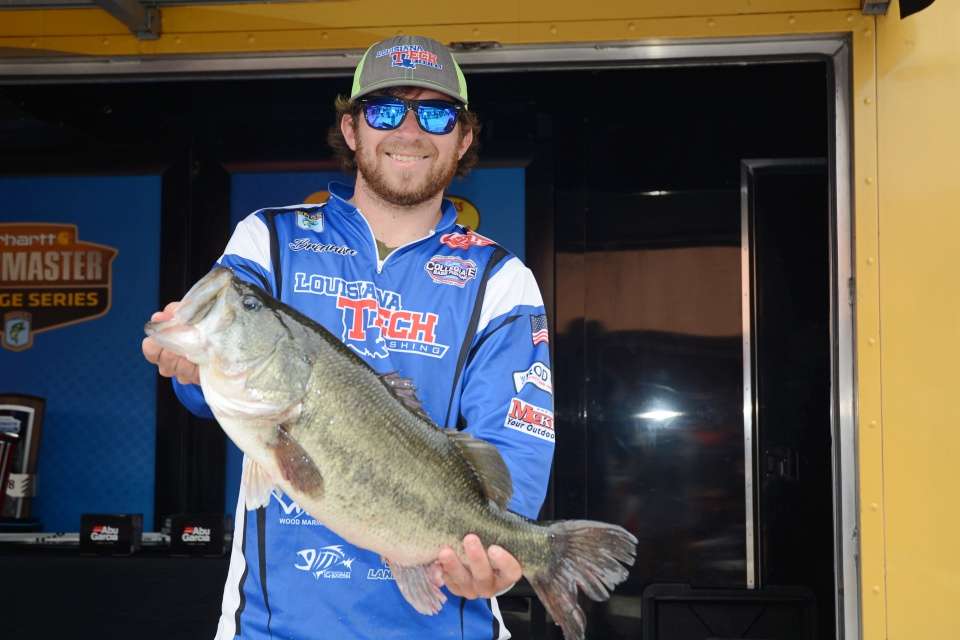 Solieau poses with a bass that added to the teamâs overall weight of 21-10.
