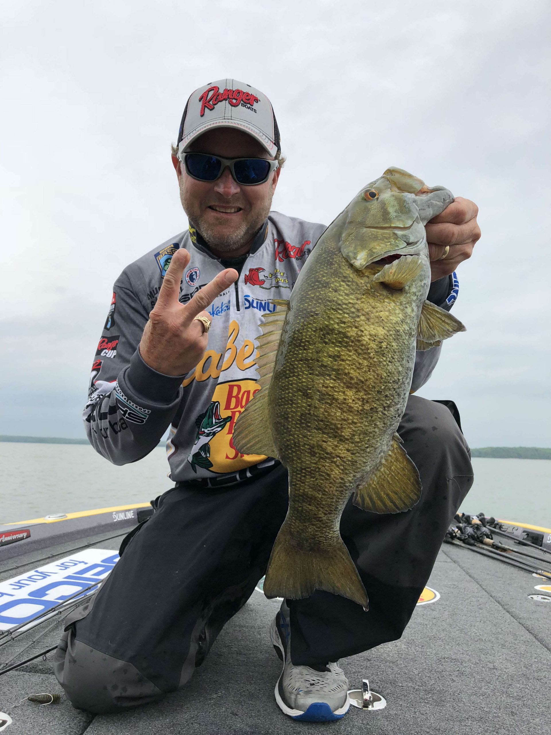 Mike McClelland did more than just take off his rain jacket. He switched to a different spot entirely and busted a nice smallmouth. This morning McClelland exhibit great patience, but something had to give. Maybe this âsmallâ switch will land a few more for the livewell. 




