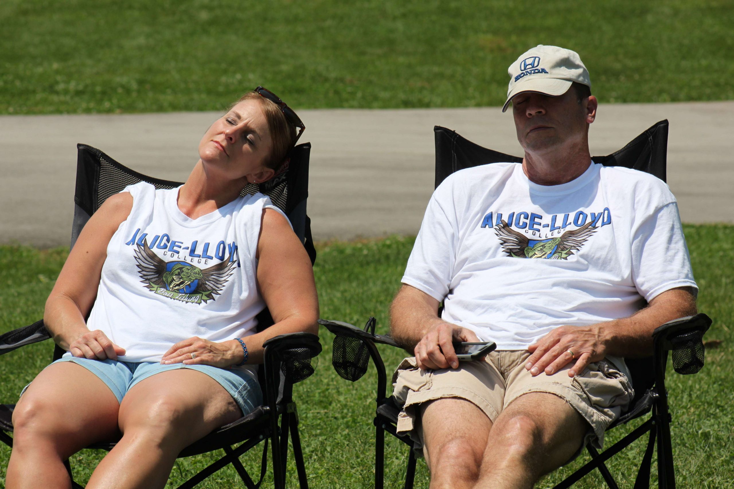 Day 2 of the Carhartt Bassmaster College Series Eastern Tour presented by Bass Pro Shops brought pleasant weather, rather than Thursdayâs afternoon rain storms. Temperatures climbed into the upper 80s, which had fishing fans seeking shade at the TVA Dam Ramp in Jefferson City. This couple, however, enjoyed the sunshine and took a nap in the process.