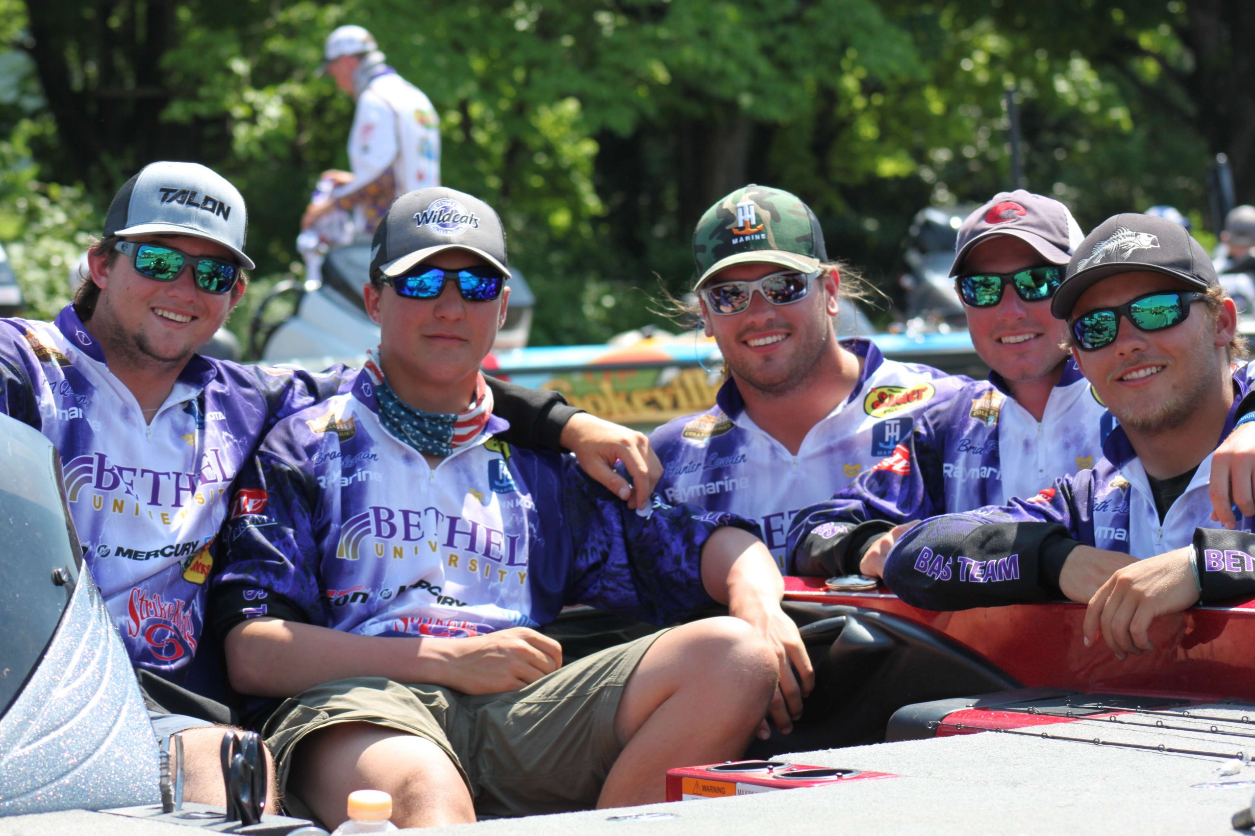 A quintet of Bethel University anglers pose for a photo before weigh-in. Six tandems from Bethel made the cut to 32 teams. 