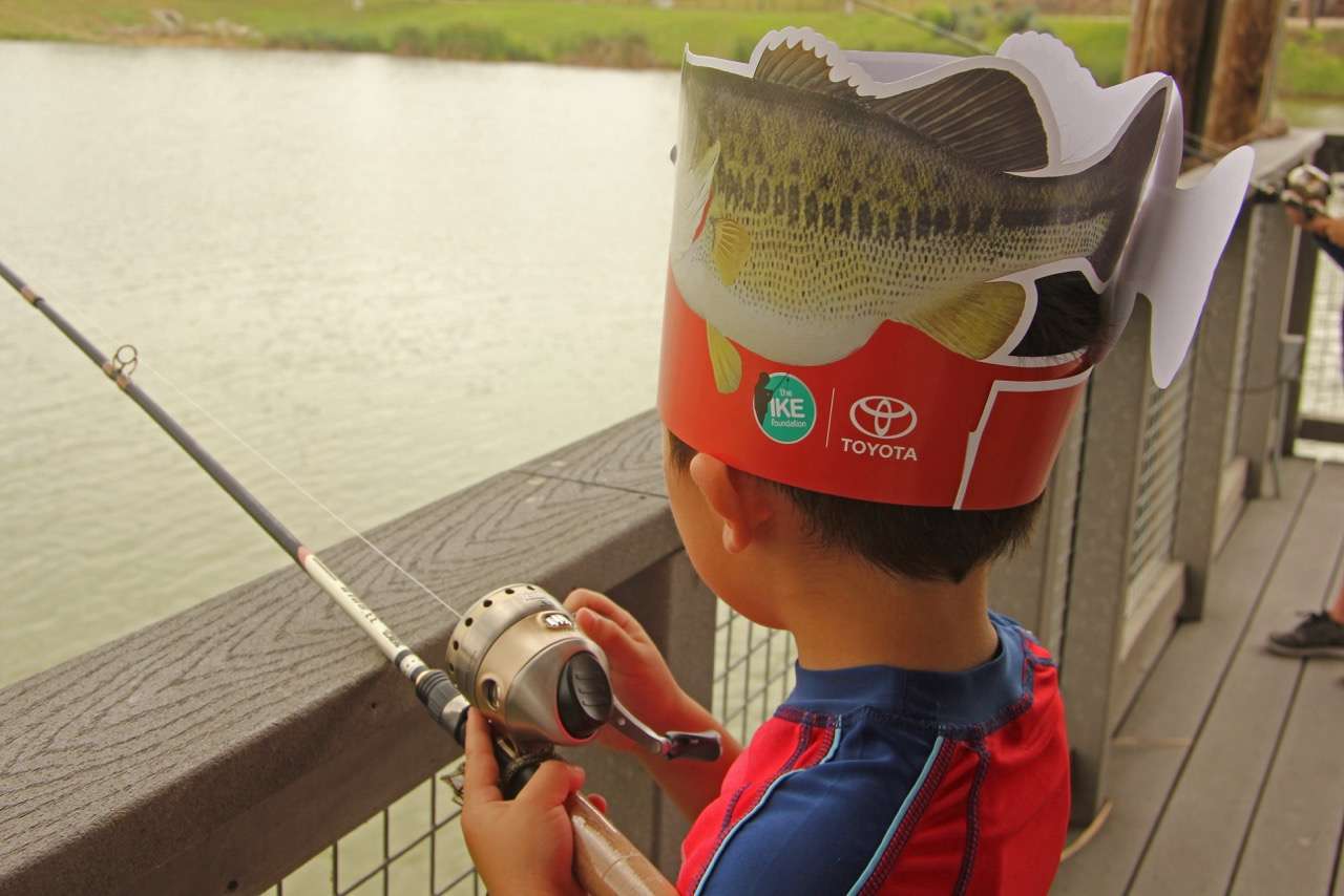 Noah sports a cool hat as he waits on a bite at the end of his Zebco rod-reel combo. 
