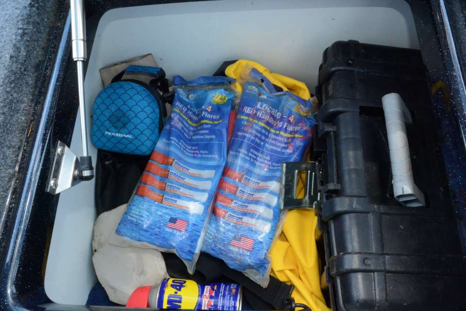 On the opposite side is a compartment reserved for the gear of a Bassmaster Elite Series marshal. Safety gear is there too, including flares and other mandatory boating safety items. 