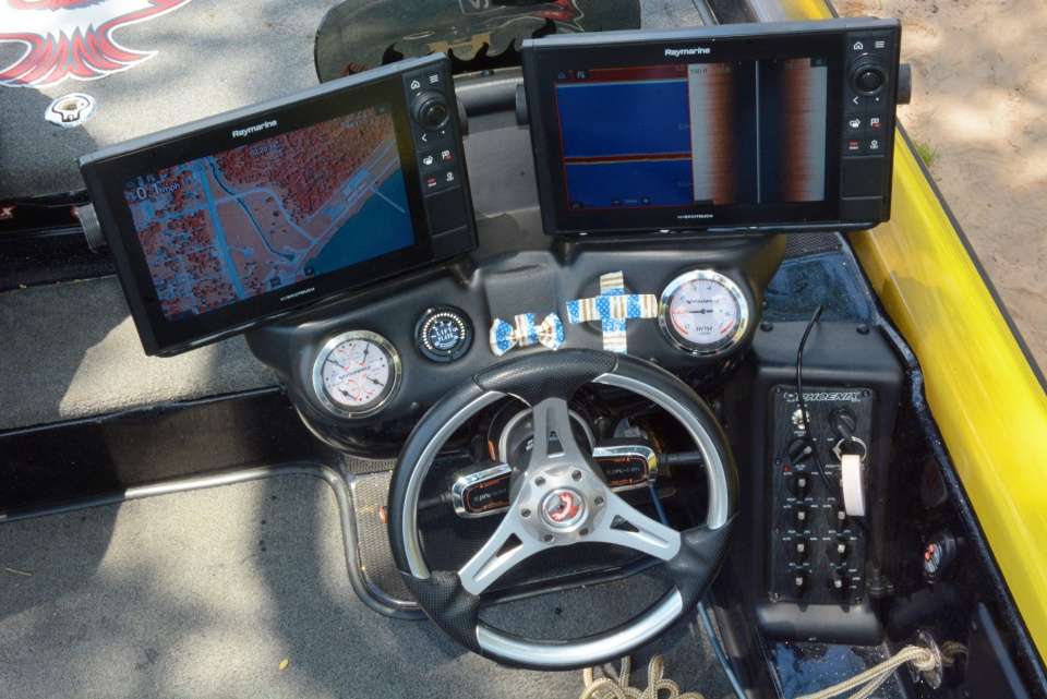At the helm is a console where high-tech and family mementos share space. âWhat I really like is how Phoenix engineered an inset at the top of the console for wide-screen electronics.â Improved visibility of the screen and safer driving are the benefits.