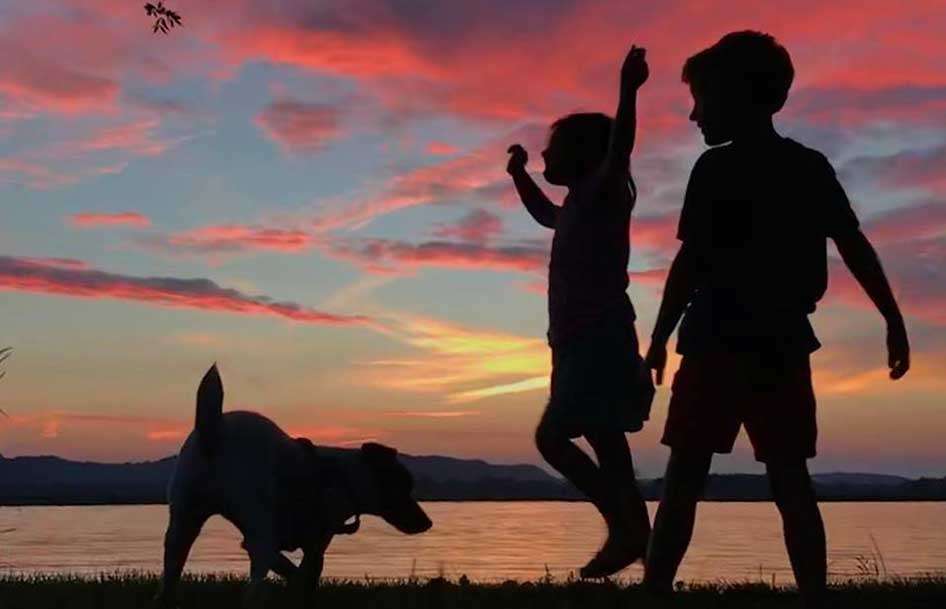 Here the Kennedy kids are caught in silhouette around sunset, which happens to be 9:30 p.m. this time of year. And itâs also just an awesome photo, another capture of what the family should remember for some time.