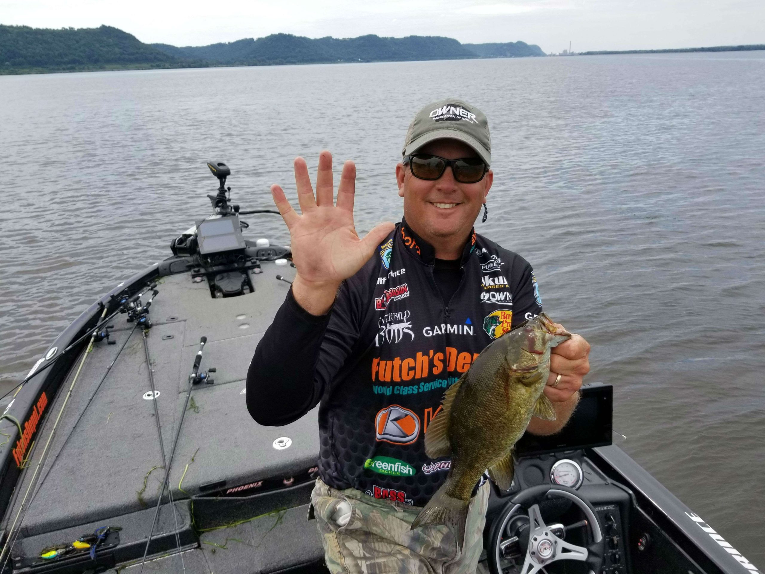 Cliff Prince feeling a little relief finally boating No.4 of the day and then just like that he has his fifth keeper. He is relieved to have his limit and will settle in and find some bigger bass.
