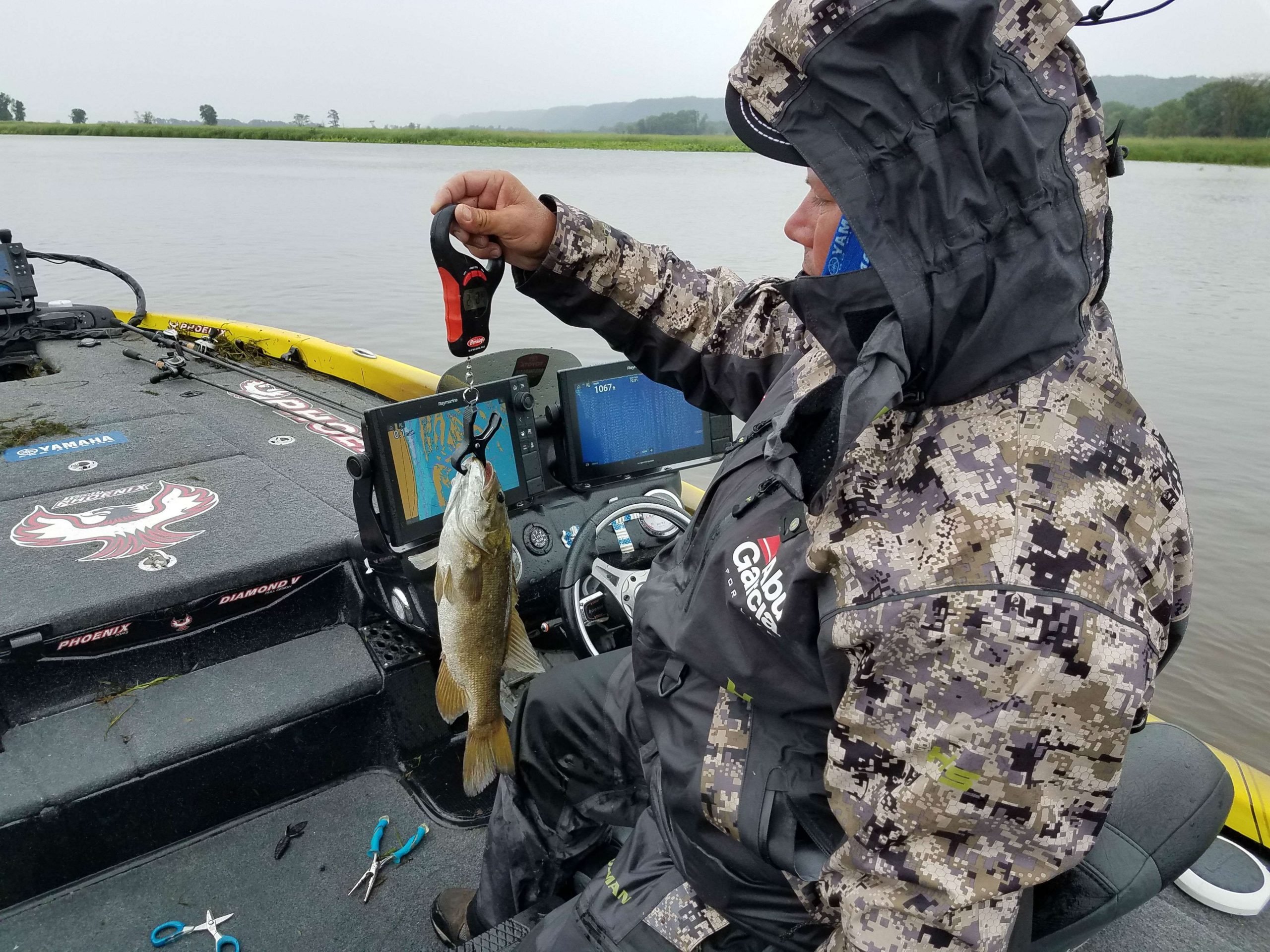 Bobby Lane just upgraded with a nice smallmouth on the Mississippi River! There is a little break in the weather from the rain and the day continues.