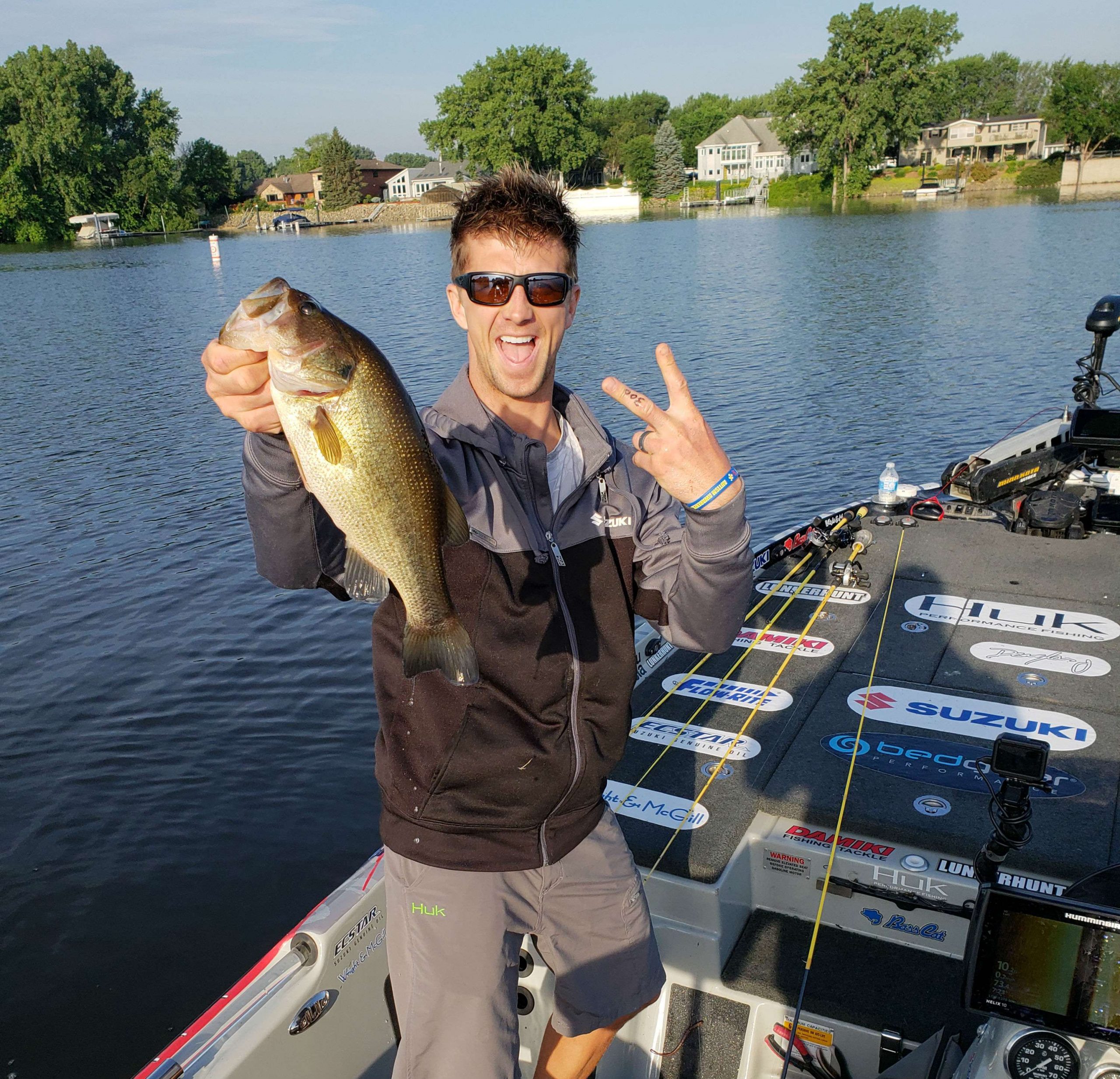 Chad Pipkens puts his second bass in the boat.