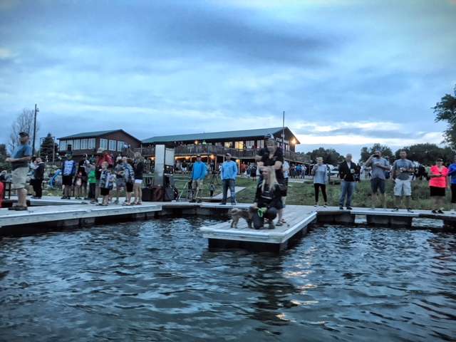 A large crowd is on the docks and at the restaurant railing to see the anglers off during the Day 1 morning takeoff at Lake Oahe.