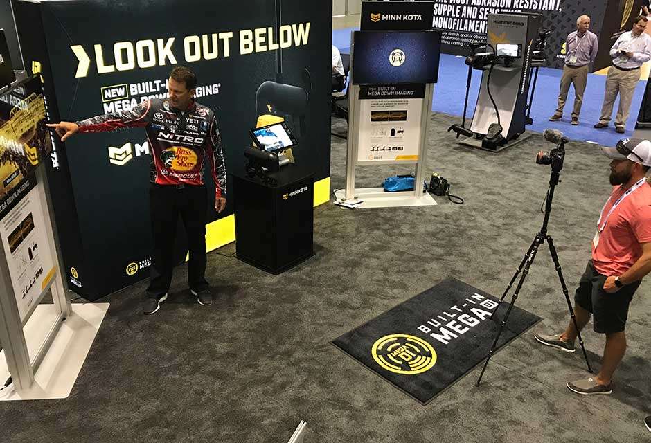 KVD does a video at the Minn Kota booth for its Ultrex with Built-In MEGA Down Imaging that won the Best of Show Boating Accessories award.