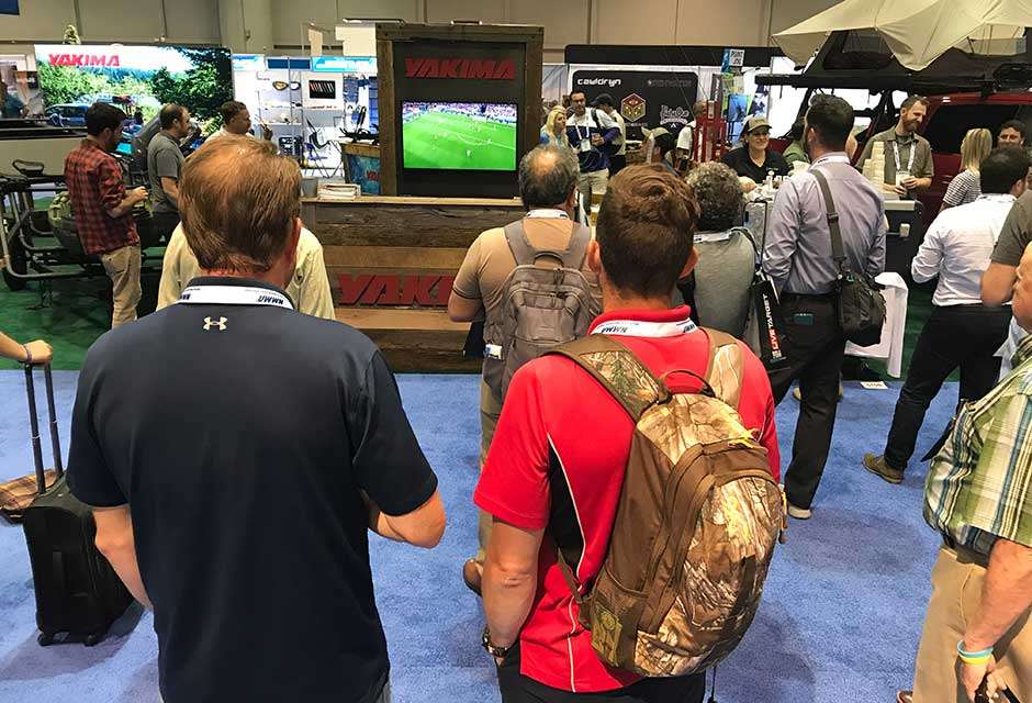 During happy hour, a number of attendees stop at the Yakima booth, not only because they had beer and ice cream, but the World Cup soccer semifinal was on TV.