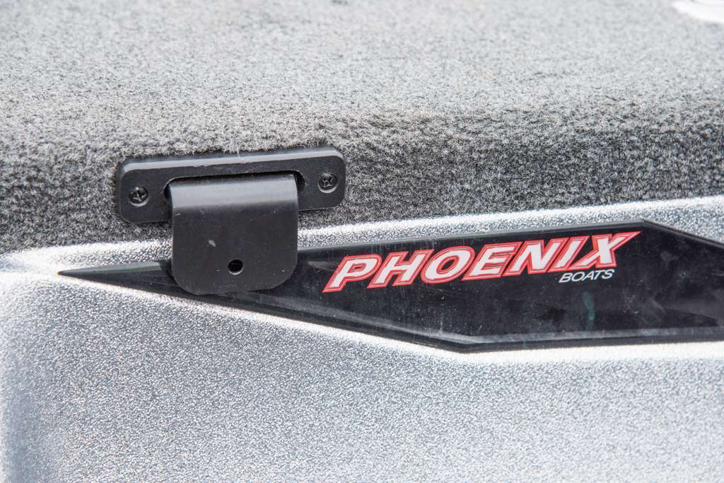 His Phoenix has a slot in the middle storage locker lid that holds Sumrallâs measuring board. This keeps the board out of the way while heâs fishing, but makes it easy for him to find it when he needs to check a bass.