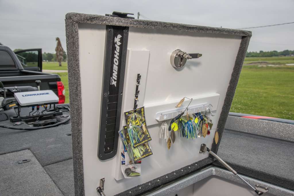 The lid of his main tackle compartment holds a measuring board and holds baits for quick access.