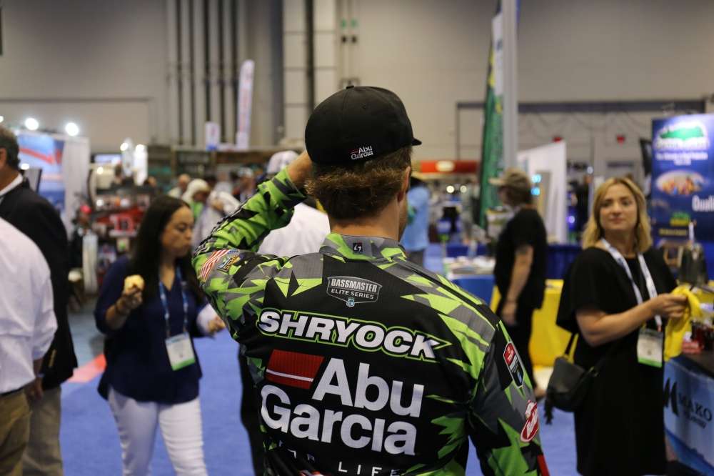 Hunter's signature bright green made him easy to track on the ICAST floor. 