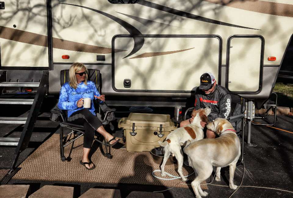 Stacy and Mike like to start the day outside with a cup of coffee. It looks like Bullseye and Lacey want some lovin, or food.