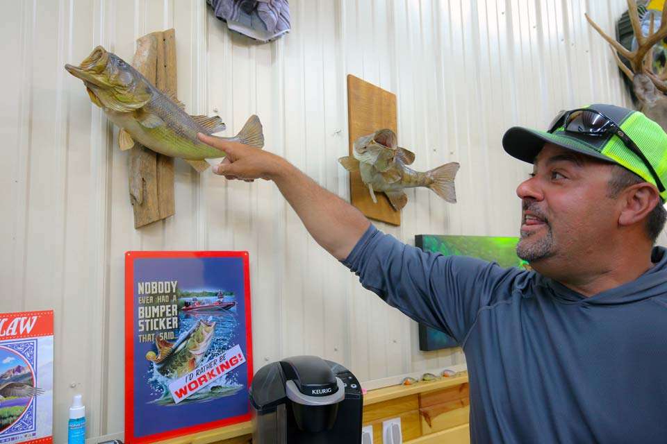 Zona points to a 3 pound, 15 ounce largemouth he caught in 1984. He won a contest and was awarded a mount of the fish. He caught it on the lake where he currently lives on a Snag Proof Moss Boss.  It sits proudly on the wall, just outside âThe Lounge Area.â
