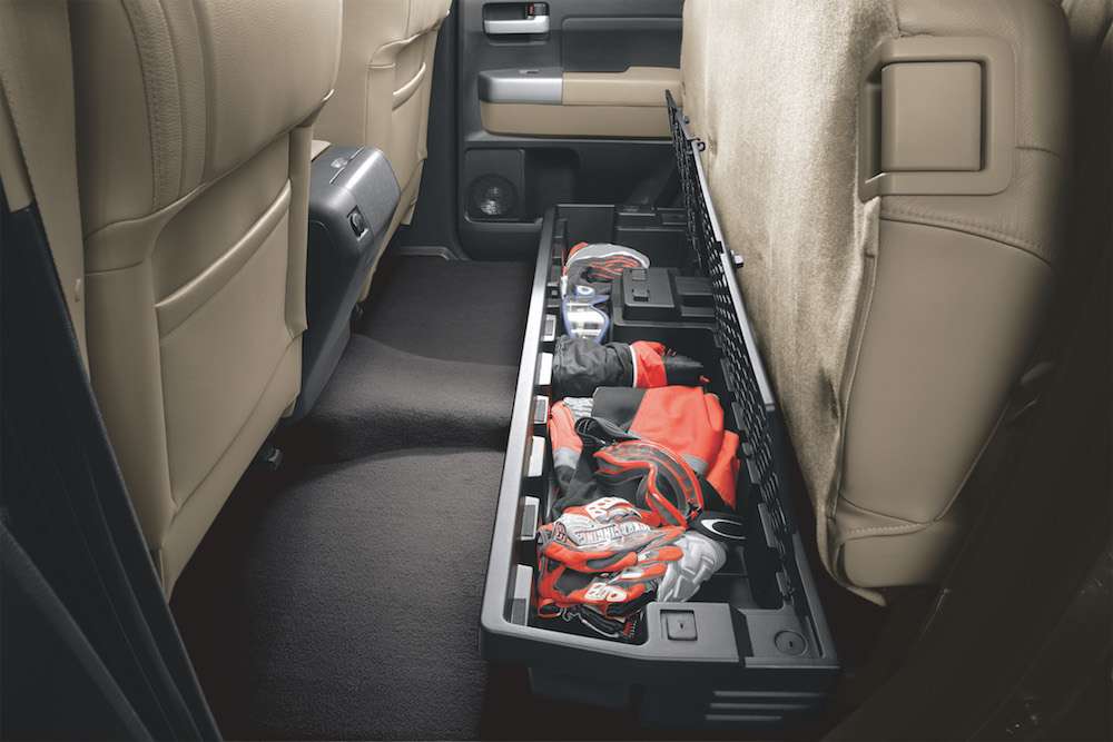 The Tundra is designed to haul big loads, but sometimes you need
to take extra care of small items that canât ride loose in the bed. The Genuine Toyota Seat Storage Compartment5 tucks neatly under the rear seats and secures your things, while keeping them safe from prying eyes.
