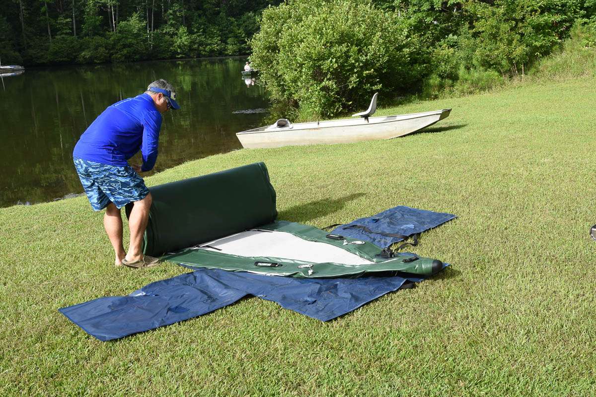 Bassmaster Editor James Hall begins the inflation process for the Sea Eagle 2-person FishSkiff.