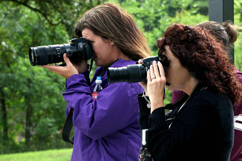 The Bethel moms, Sue Enders (front) and Bridget Huff turn cameras on their sons during the morning break