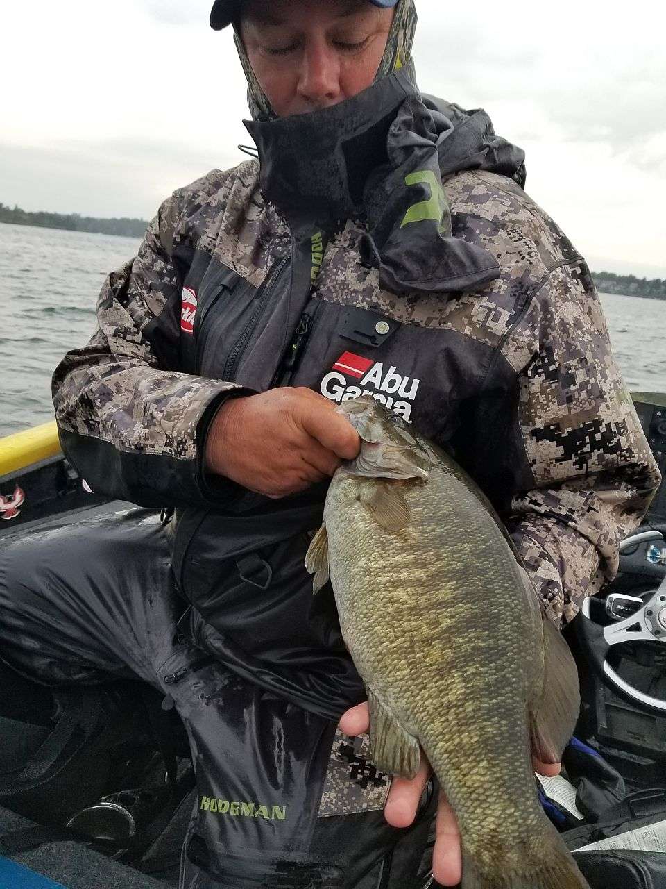 Rain rain, its Bobby Lane.  Bobby Lane Jr is off to a great start. As the rain pours down, Lane is filling up the live well.  4 keepers and hes tossed back 4. 1 more for a limit and we re only an hour in to CHAMPIONSHIP SUNDAY!
