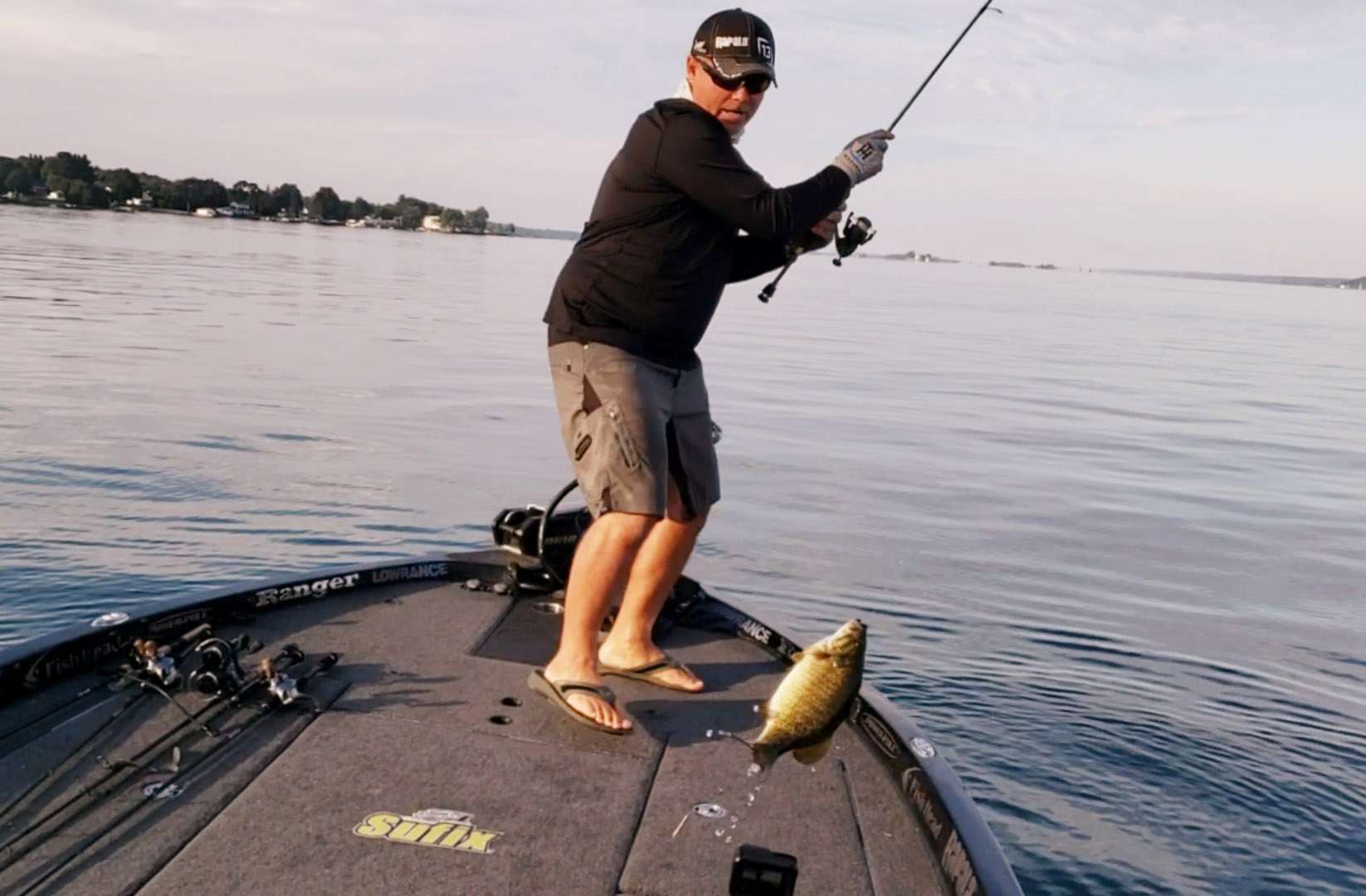 Dave LeFebre lands a boat flipping a three pounder.