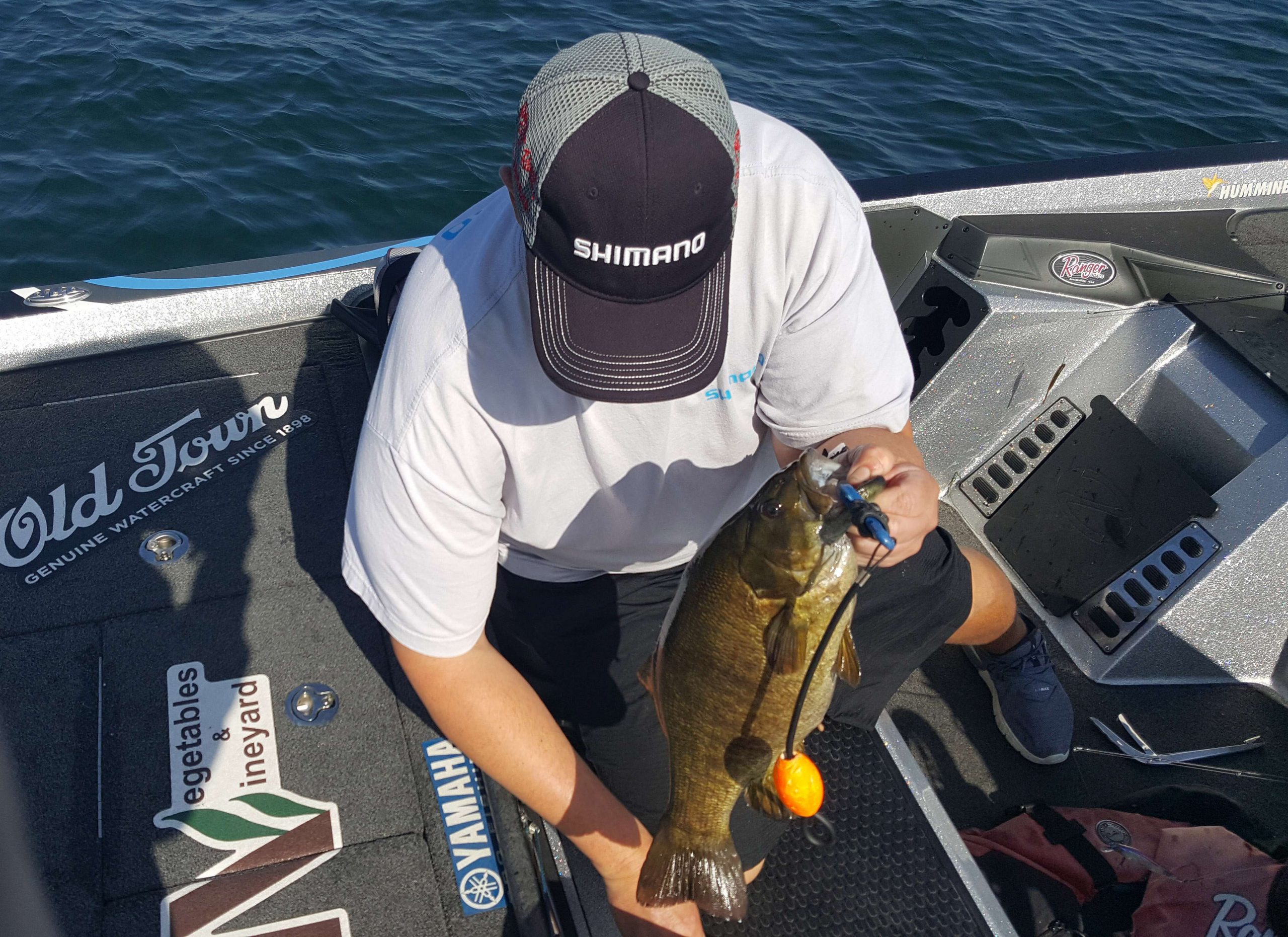 After chatting with the guys on the live show, Keith Combs pulls in another upgrade. This four pound fish was the smaller of the two that were following his bait. 