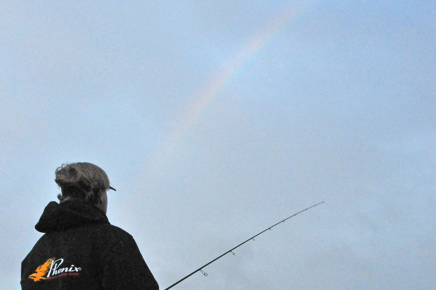 A rainbow marks a pot of bronze for Pirch, who said he wished he could get a bend in his rod to match the arch of the rainbow.