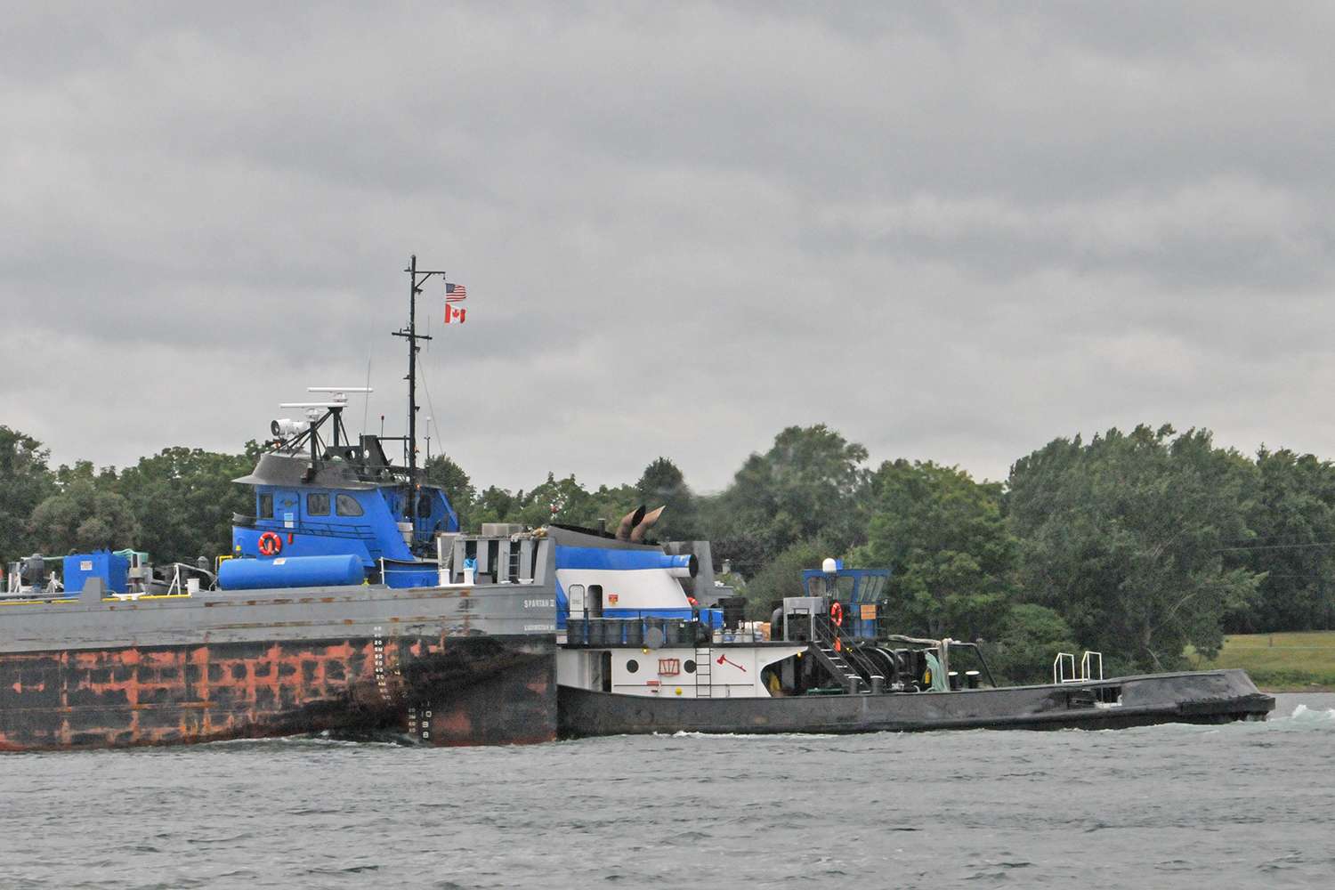 Barges and container ships are constant companions during a day on the St. Lawrence.