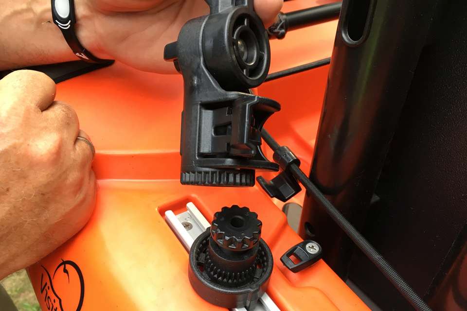 The Yak Attack LockNLoad mounting system secures to the GearTrac and mounts compatible accessories like this Omega Pro rodholder.