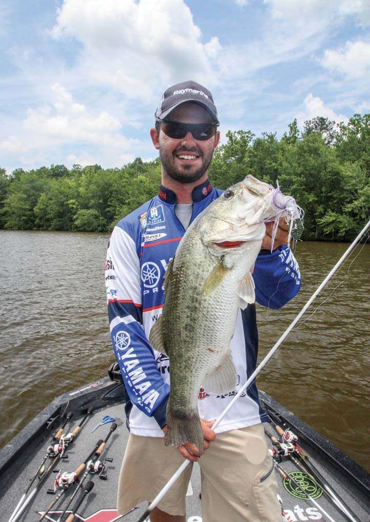 <b>12:57 p.m.</b> Hamilton casts the bladed jig to a lone stickup and gets a solid strike. His fifth keeper is a chunky 3-14 largemouth. âMan, he smoked it! Bass will sit on any little piece of wood cover they can find in the spot like this. I got my limit; now I need to cull that pounder.â
<p>
<b>1 HOUR LEFT</b><br>
<b>1:01 p.m.</b> Hamilton gets a jarring strike on the Break Blade, but the bass comes unbuttoned. <br>
<b>1:03 p.m.</b> Another bass bumps the blade bait. 
