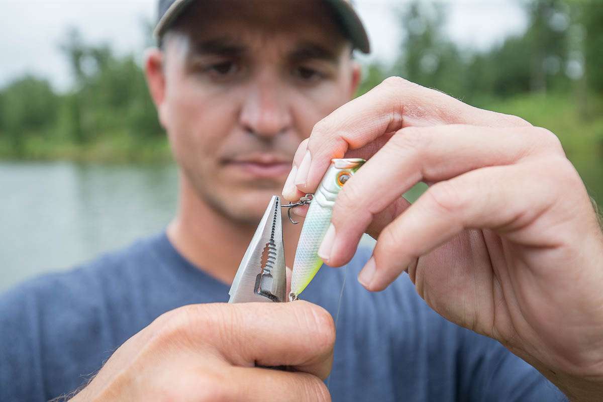 With conservation as a focal point for not only his career, but also an effort moving forward with his new relationship with Forty Creek, Ashley bends the barbs back on one of his topwater lures. 