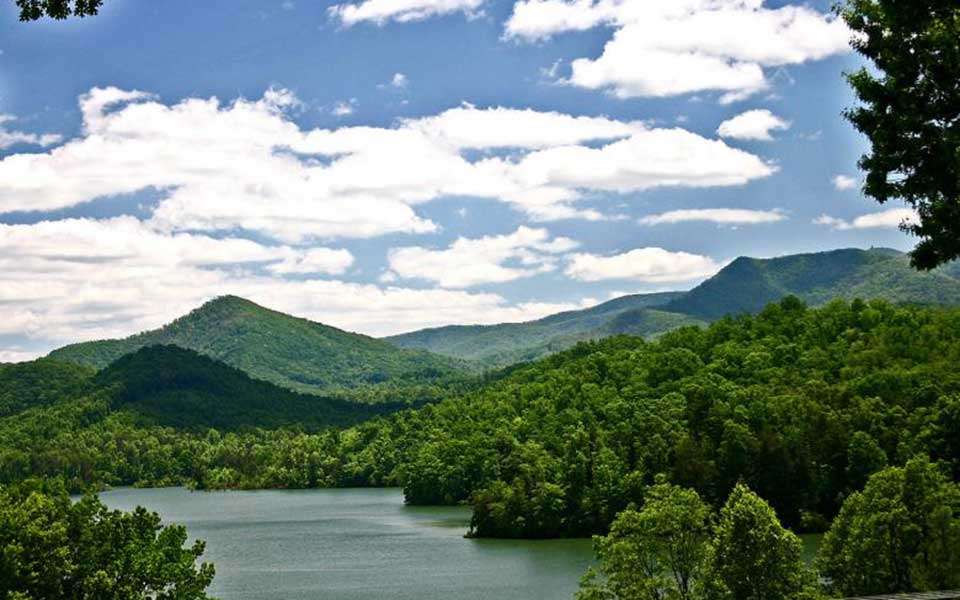 Chatuge is a clear water lake in the Blue Ridge Mountains that sits about 1,922 feet above sea level. The lake averages around 30 feet deep and is 144 feet deep at the dam. 