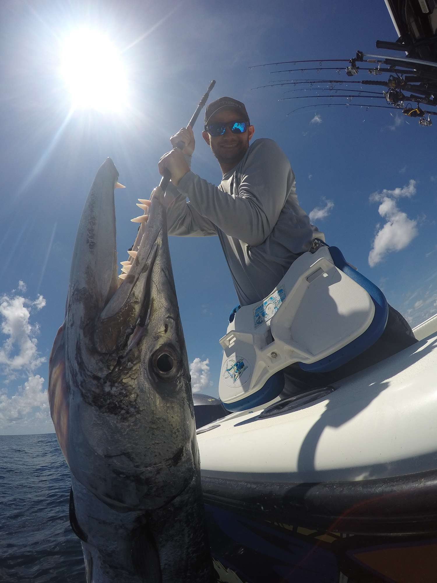 Lee gets a vicious hit on the surface and the fish is definitely not a snapper. When he gets it to the boat, he learns that a barracuda was responsible.