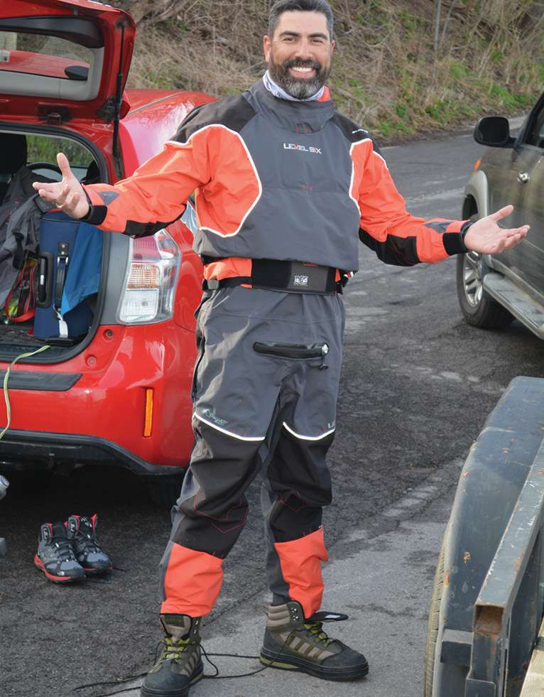 Donning a dry suit is not intuitive. The first time I tried, I ended up on my back, on my bed, with my wife shoving the rubber booties over my feet. I felt like a toddler. The whole process took about 45 minutes and was such a strain I had the ironic thought I might have a heart attack putting on a suit meant to save my life. Now, since Iâve learned the step-by-step method from Jackson Kayak pro Roberto Briones, I can do it in just over 5 minutes â all by myself like a big boy. 
<p>
With cold-weather kayak angling opportunities, a dry suit is a great safeguard against hypothermia if you fall in. They keep you nice and dry in rainstorms, too.
<p>
<em>All captions: Dave Mull</em>