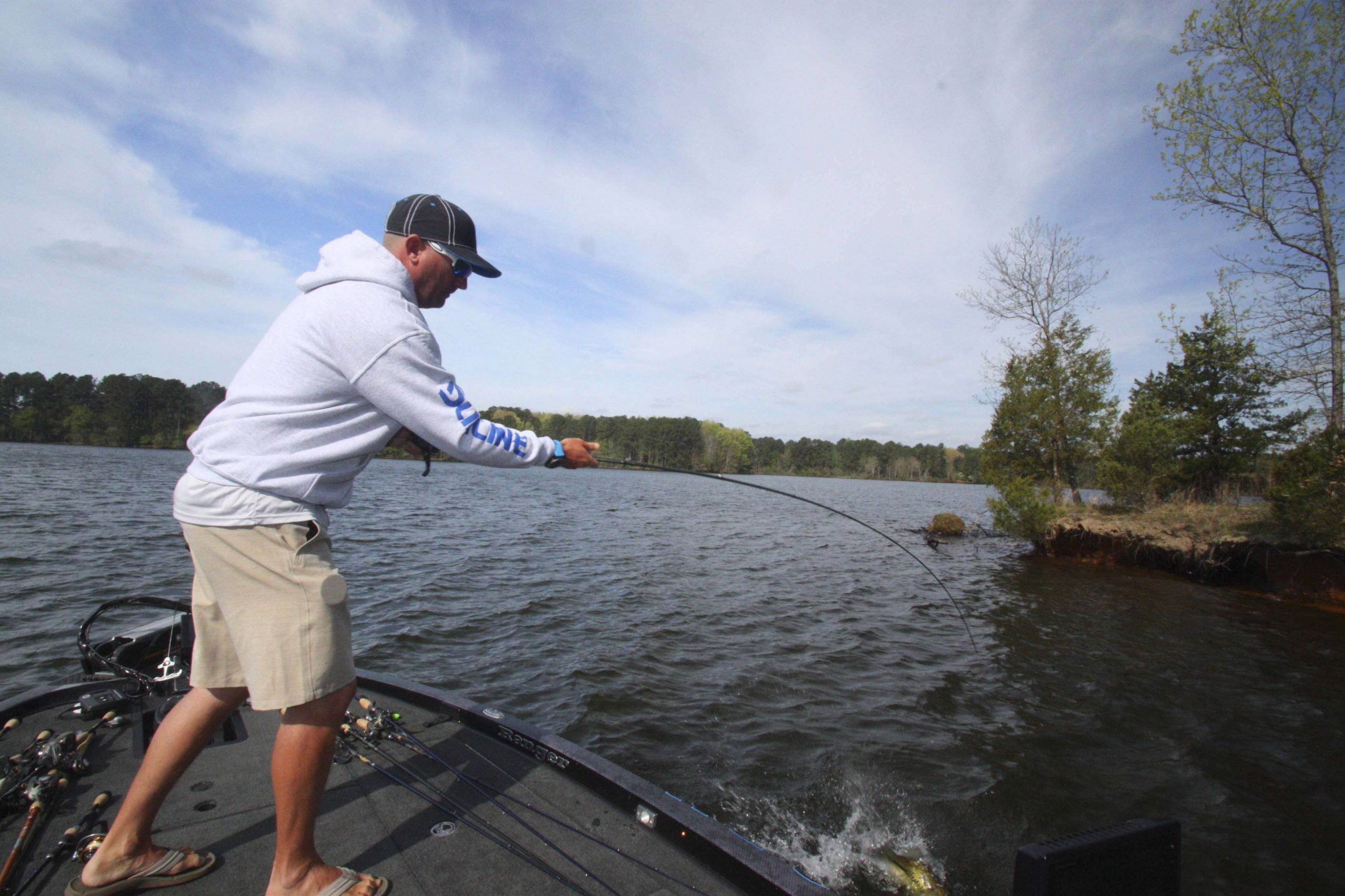 <b>4 HOURS LEFT</b><br>
<b>9:45 a.m.</b> Grigsby casts the jig to a submerged log on a clay point and sets the hook in a good fish. He works it closer and swings aboard keeper No. 3, 3 pounds, 14 ounces. 