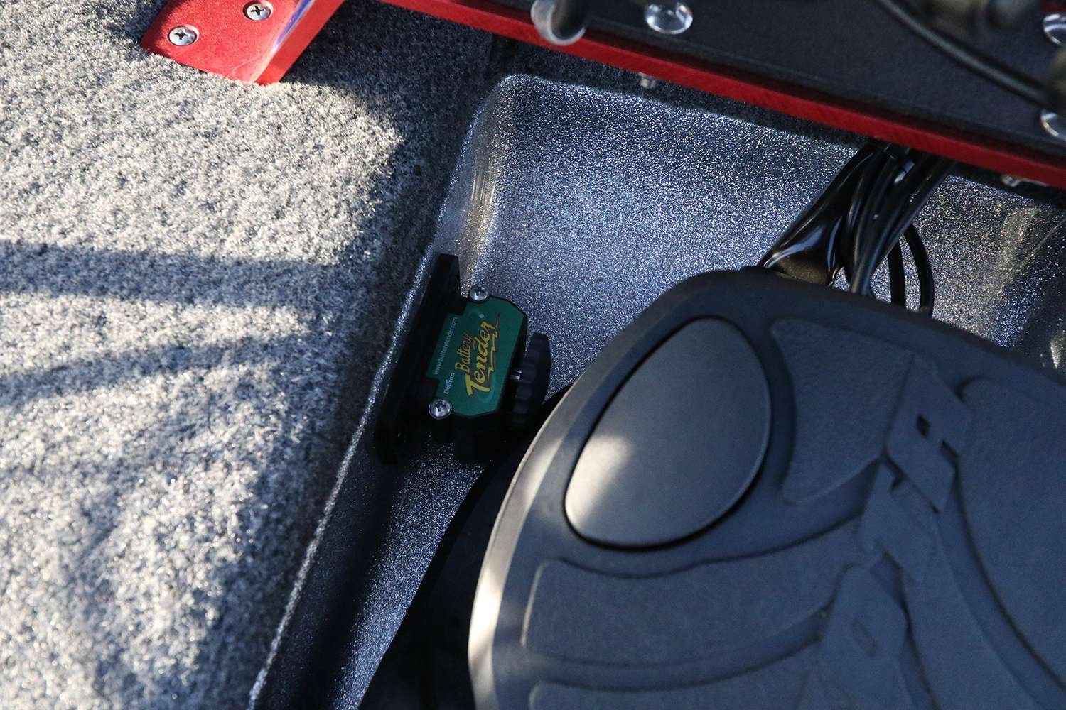Inside the recessed foot pedal area is a power switch for the trolling motor batteries. 