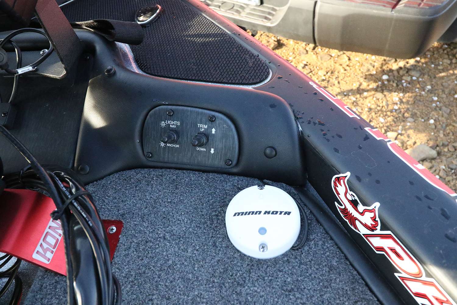 Opposite the Hydrowave is the Minn Kota GPS puck, and front end trim controls for his Yamaha SHO.