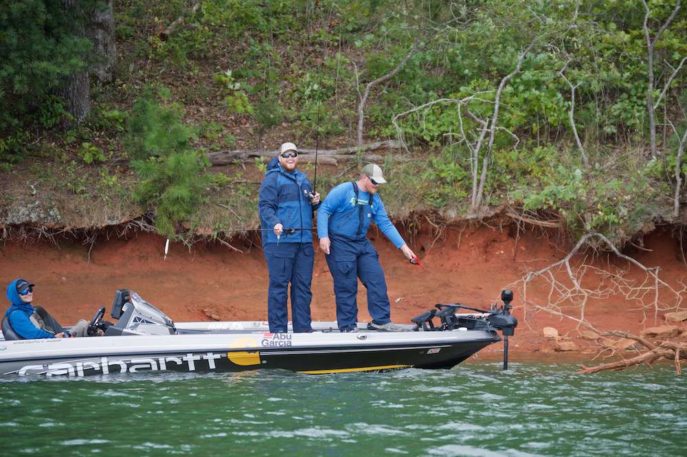 As some clouds rolled in, they threw on their Carhartt Shoreline Angler Rain Suits and headed shallow to look for largemouth.