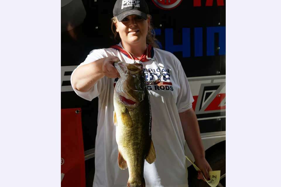 Hannah Gryder, who fished with former Elite Series pro Ben Matsubu, holds her big fish, a 4.92-pounder.