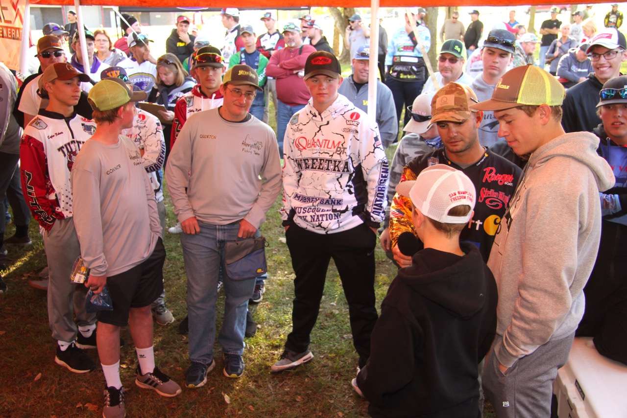 Matt Lee interviews eventual winners Micah and Noah Belt while other anglers listen to the details of their winning pattern. 
