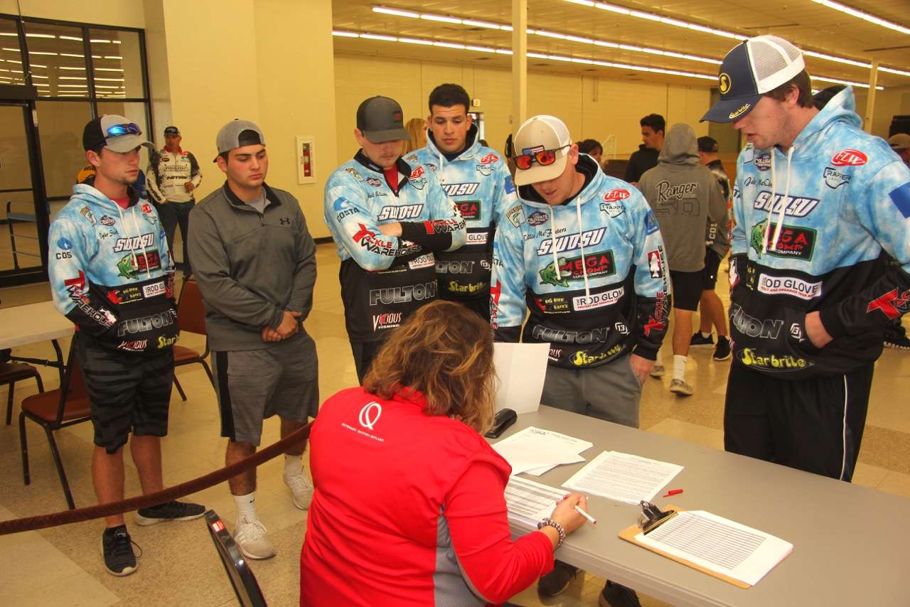 Teams are greeted by a well-organized group of volunteer employees from Zebco at the Saturday evening registration. 
