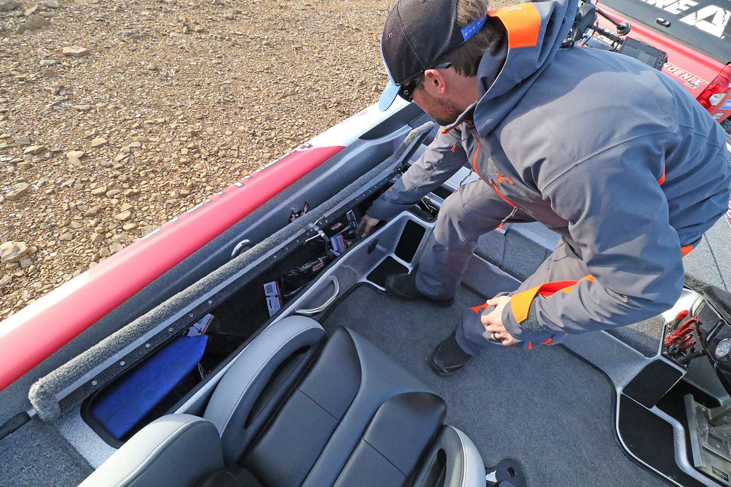 This storage compartment was likely designed for co-angler rods, but Lucas uses it for extra Rod Glove storage, and other odds and ends.