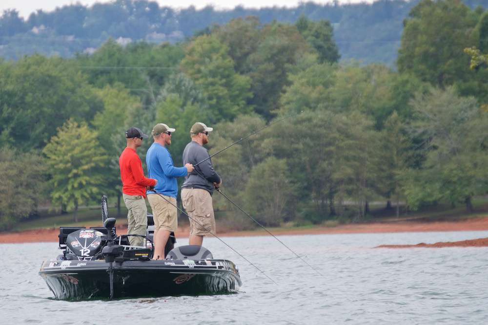 Still throwing topwaters, the three anglers hit several long sloping points.