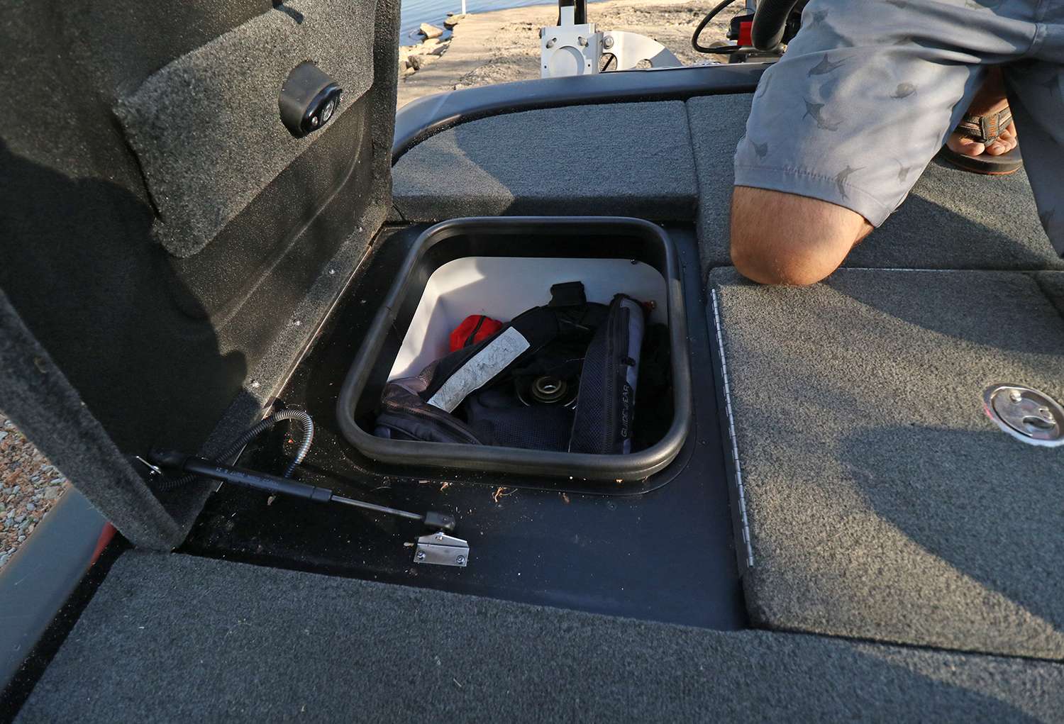 Behind the driver's seat is a storage box worth looking into.