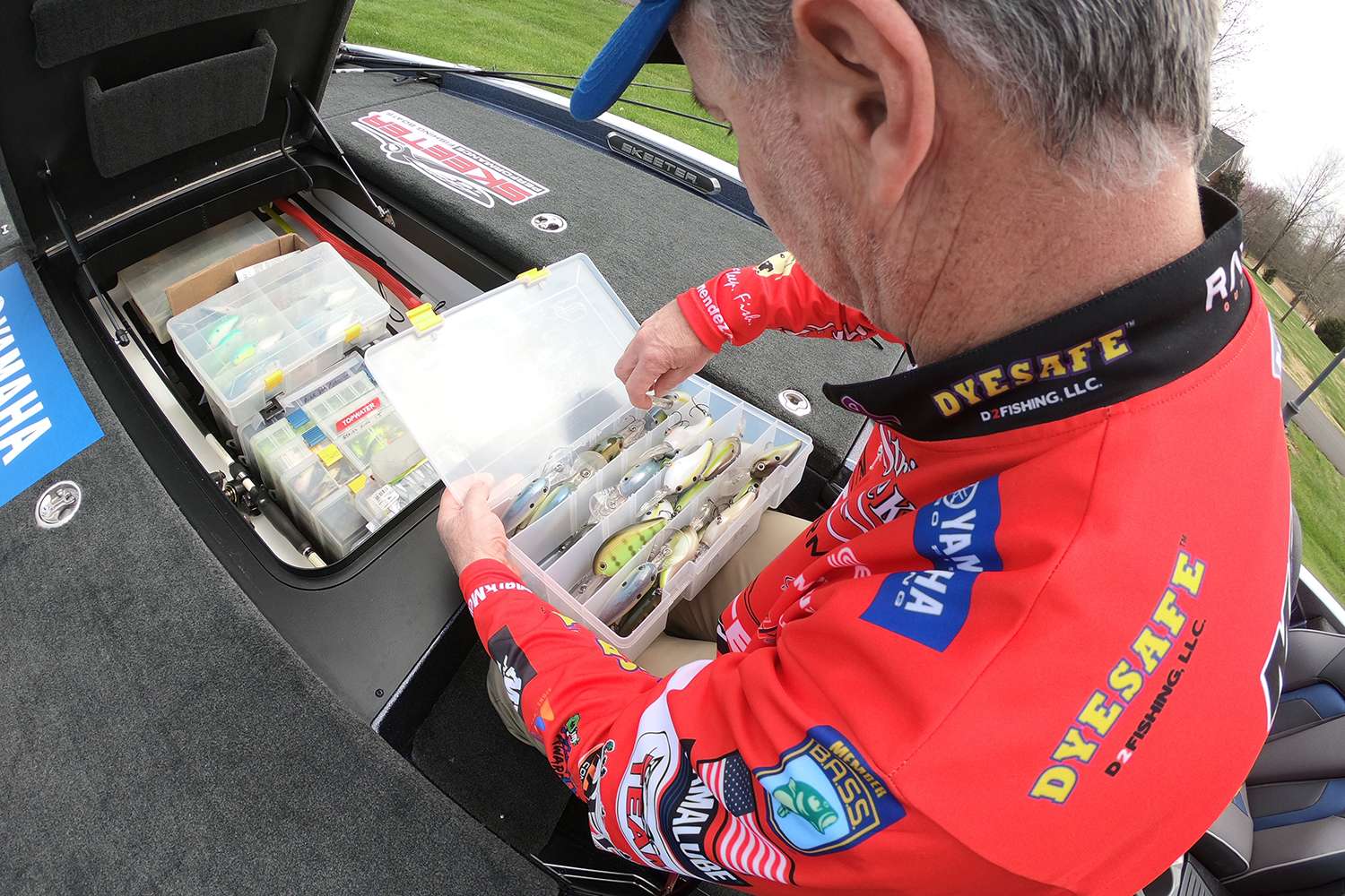 Menendez has a bunch of tackle stored here, including more crankbaits. 