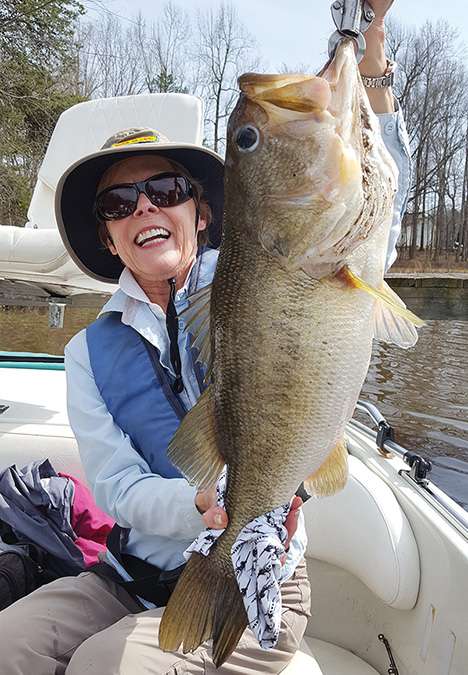 11-12<br> <b>Carol Chelette</b> <br> Private lake, North Carolina<br> Bass Pro Shops Tournament Series jig (red shad) 