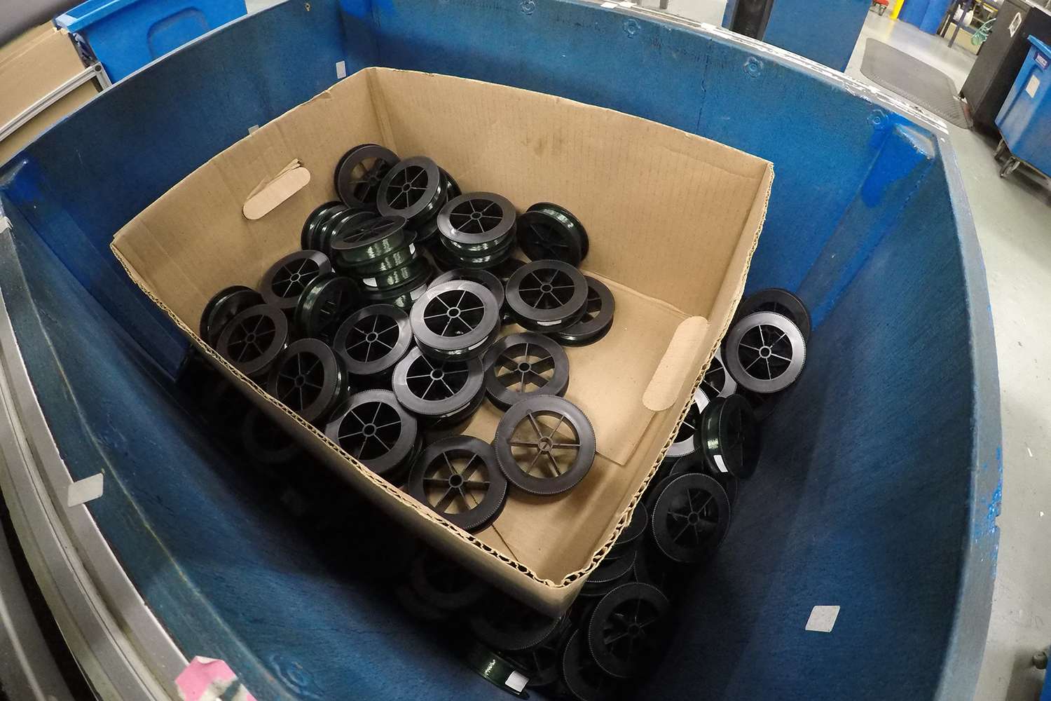 Here the loaded spools are awaiting packaging materials. 